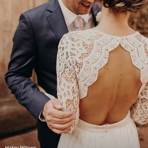 White long-sleeve maxi dress with lace details